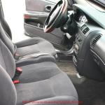 With the arm rest up, 6 can be in this Dodge Intrepid